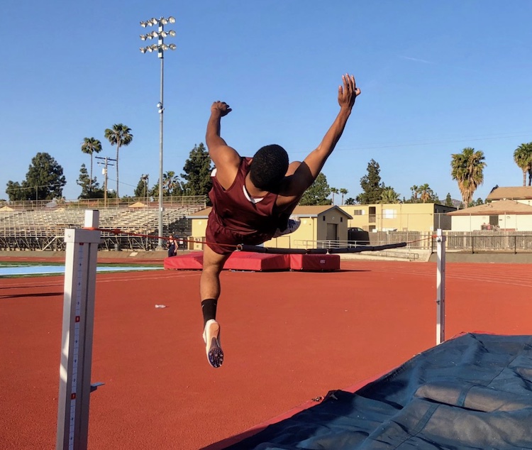 SET High student in the middle of a high jump.